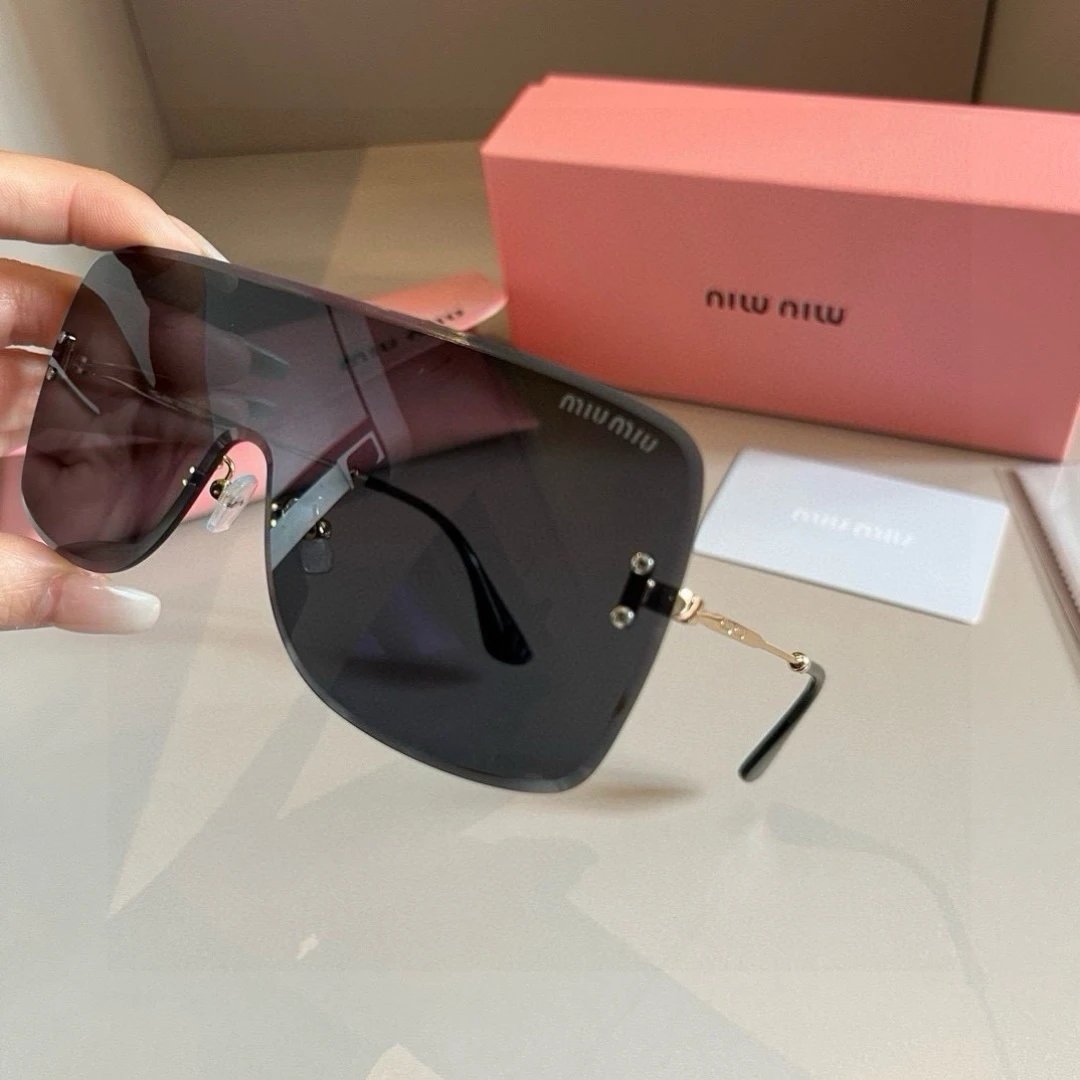Miu Miu stylish black sunglasses