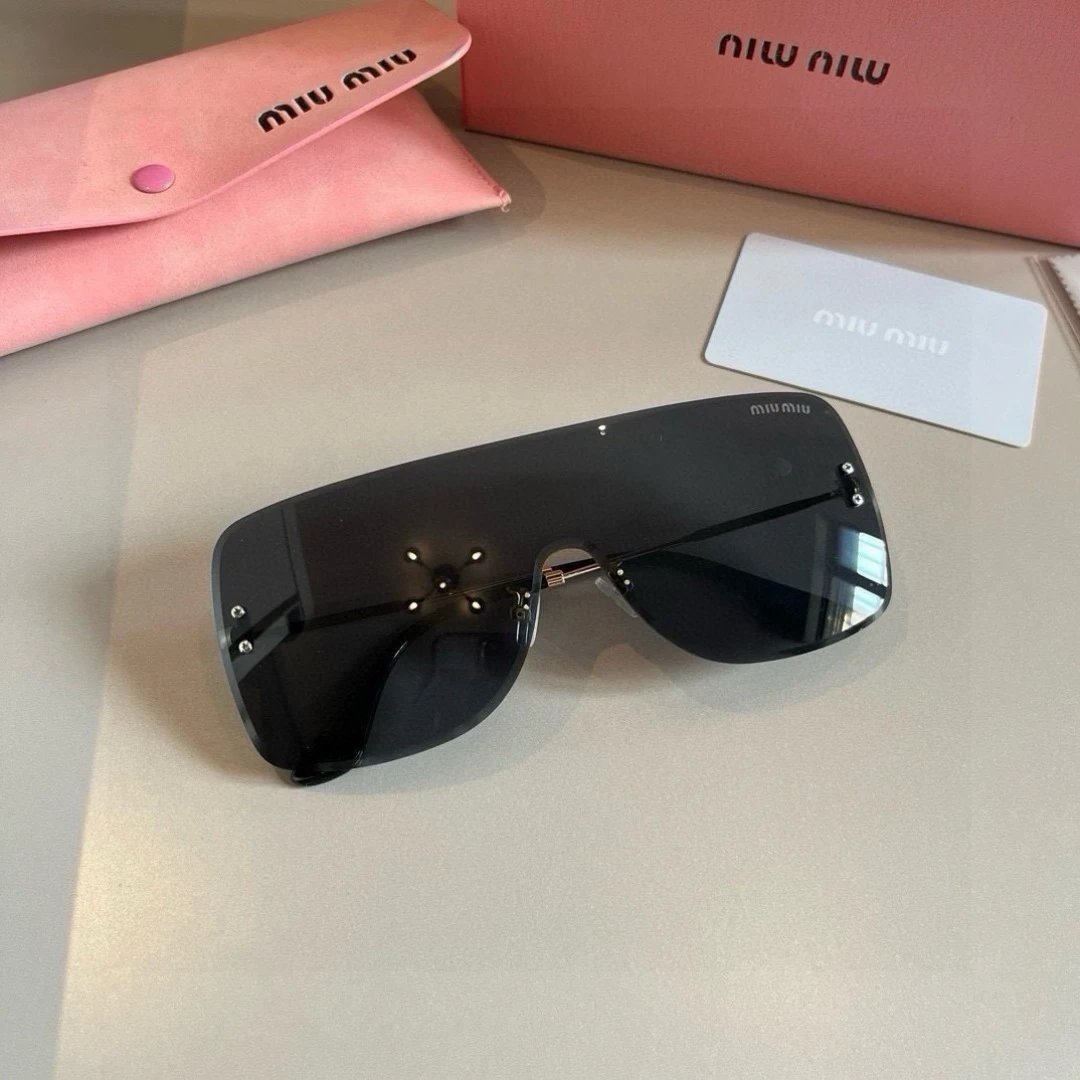 Miu Miu stylish black sunglasses
