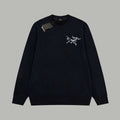 Bluza Arc'teryx z czarną bluzą z małym ptakiem